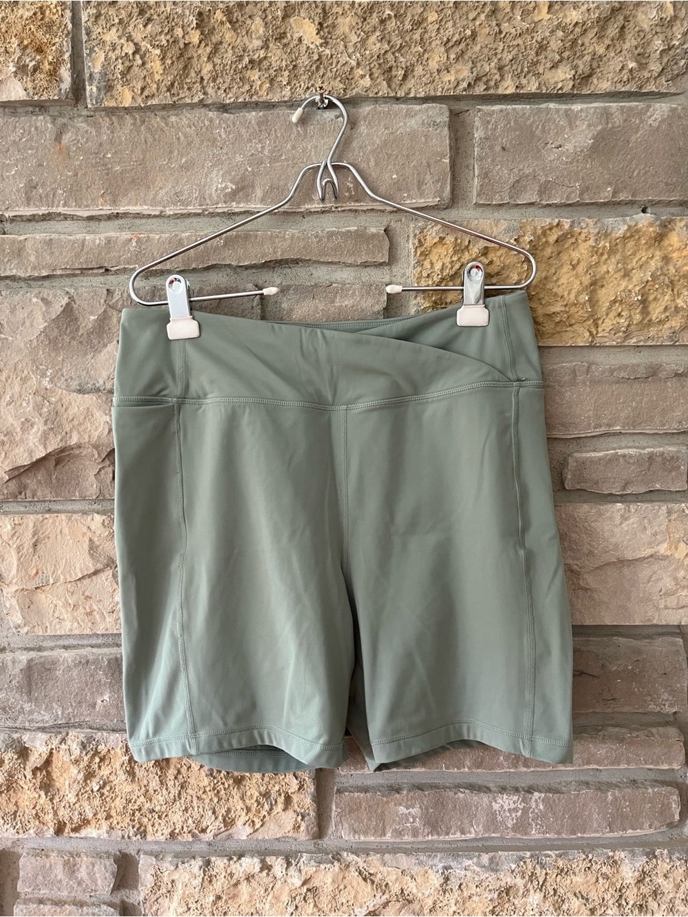 Danskin sage green bike shorts with crossover waist and pockets! Size XL